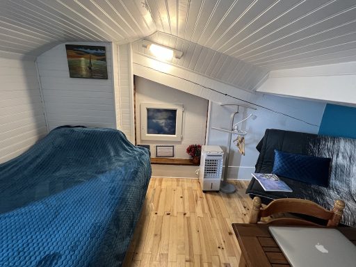 Vue sur la chambre Goélette bleue et blanche